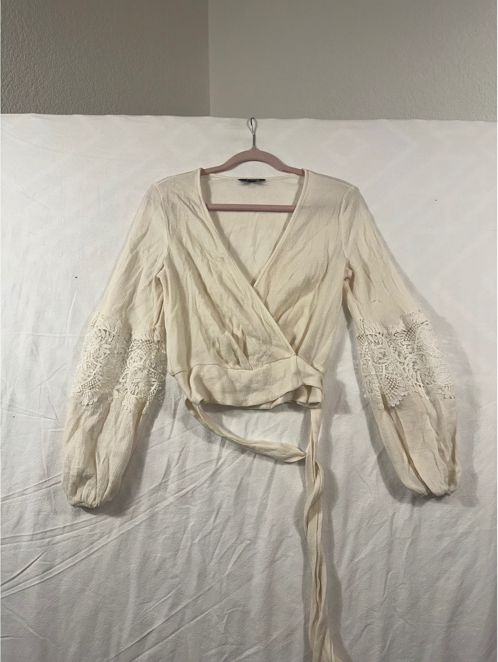 Express cream wrap blouse with lace sleeves